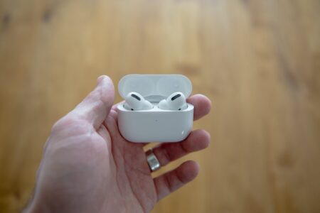 Top 10 Fix for Airpod Case not Charging holding-airpods