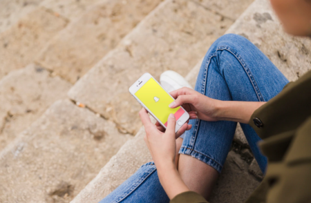 Best Fixes for Snapchat Stuck on a Loading Screen (2023) sitting using snapchat